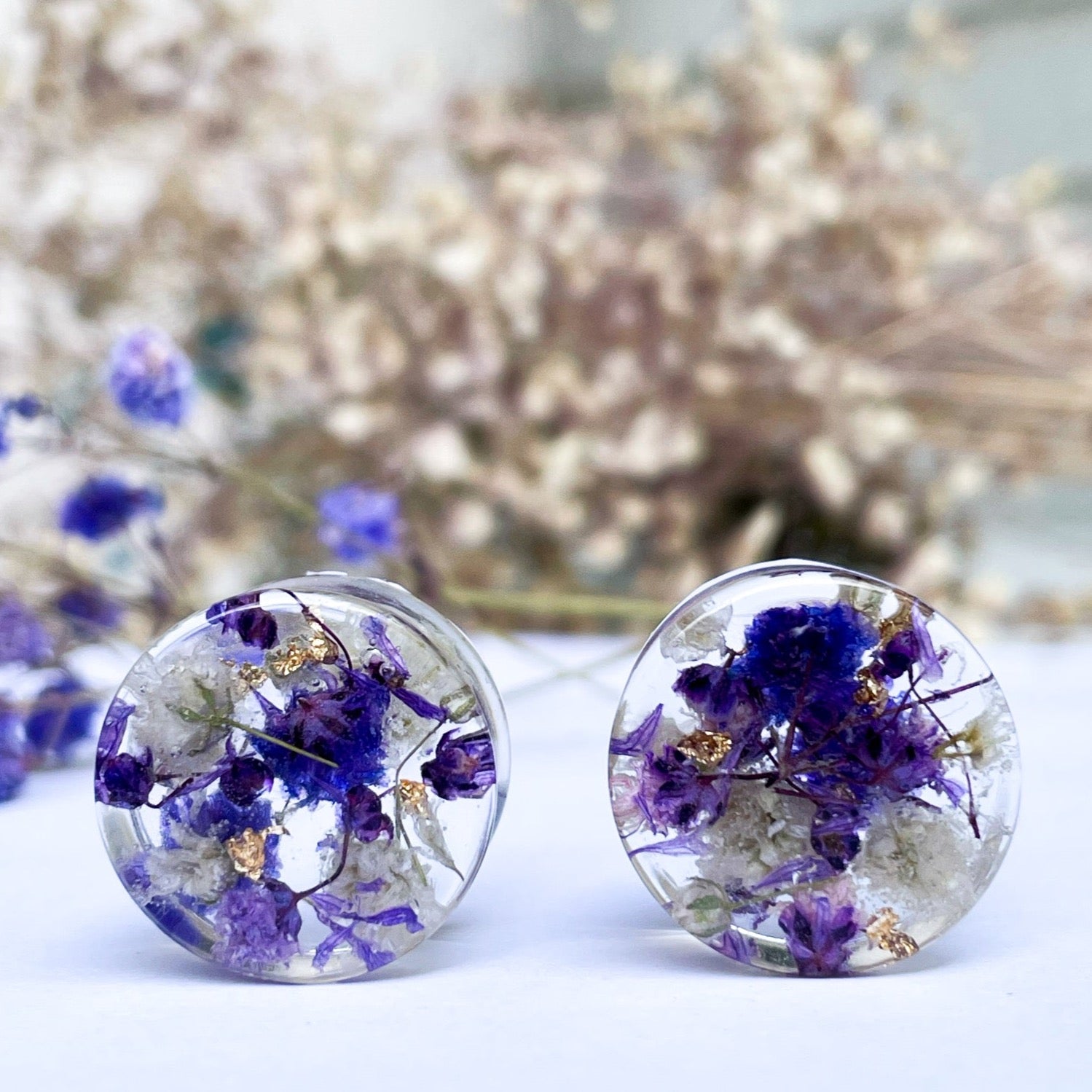 Purple and White transparent ear gauges