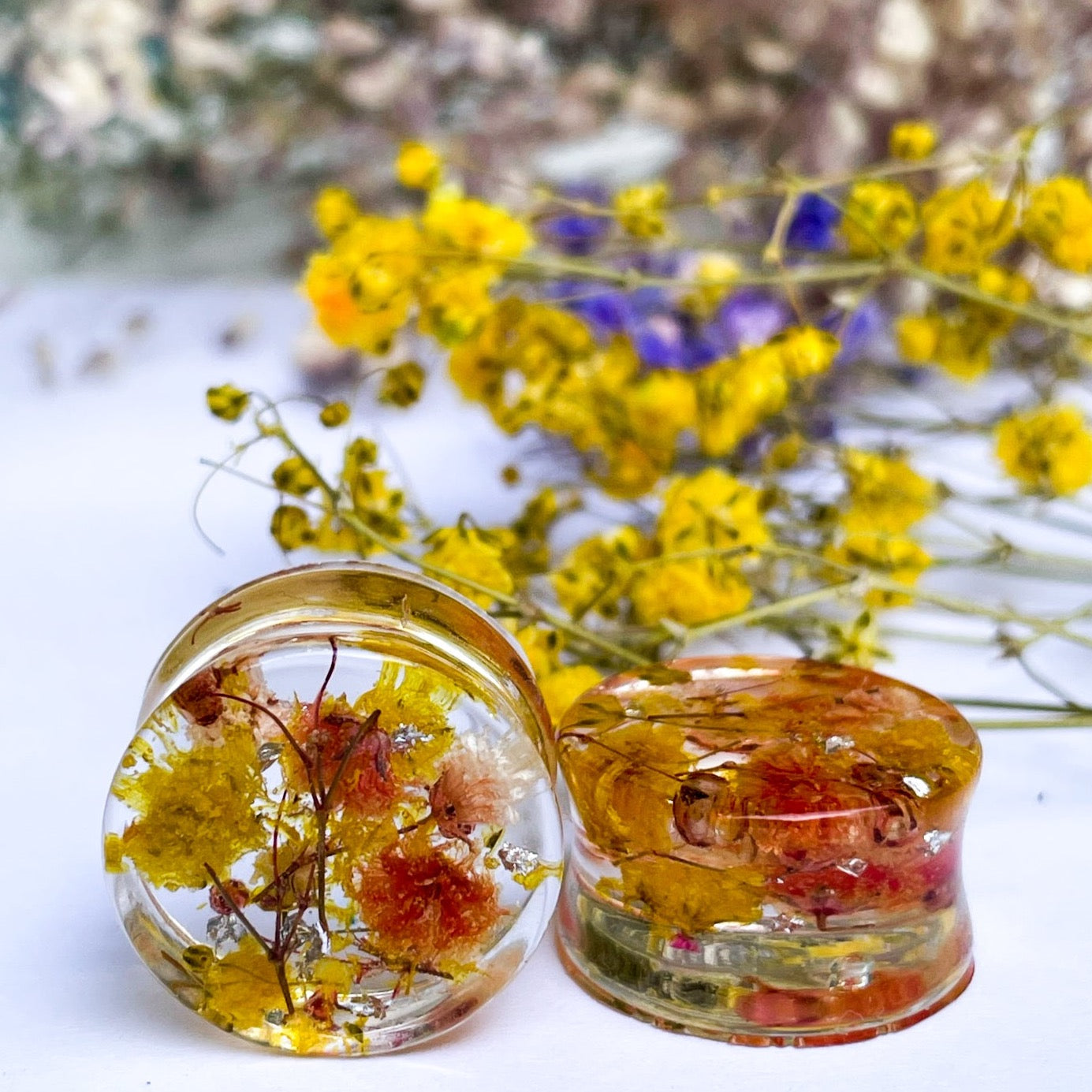 Yellow and Orange flower ear gauges