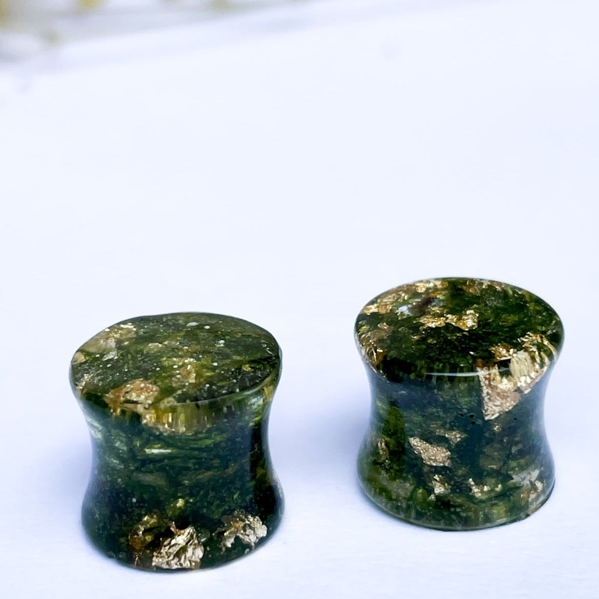 Moss ear gauges