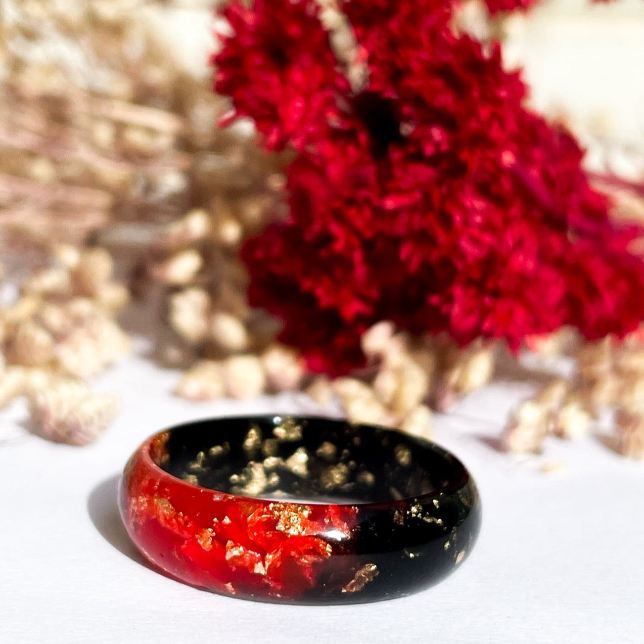 unique Red and Black resin ring with gold colour flakes