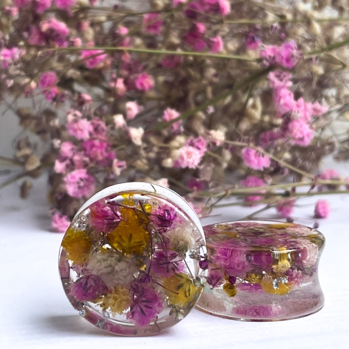 Pink, yellow and white flower transparent ear gauges