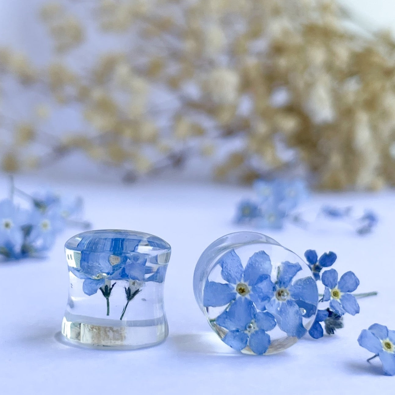 forget-me-not transparent ear gauges