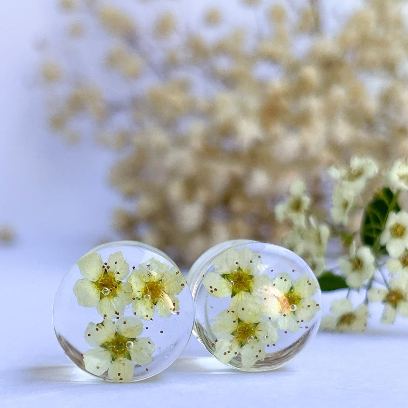 White and Yellow flower transparent ear gauges