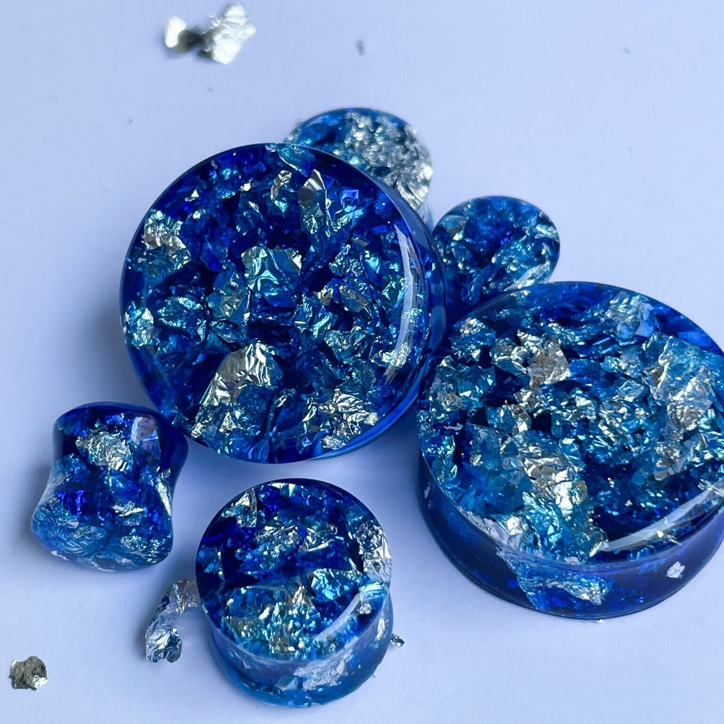 Blue resin and silver colour flake ear gauges