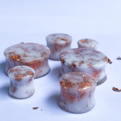 White resin ear gauges with cooper colour flakes