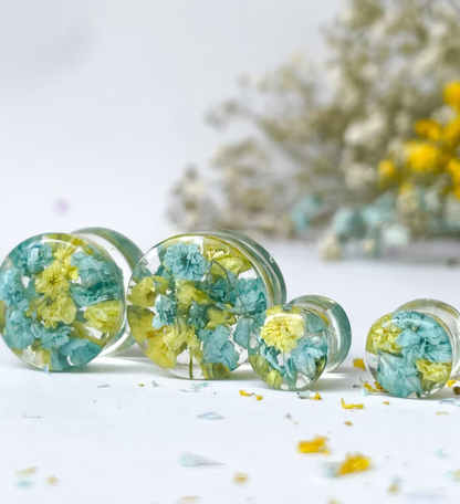 Blue and yellow flower ear gauges