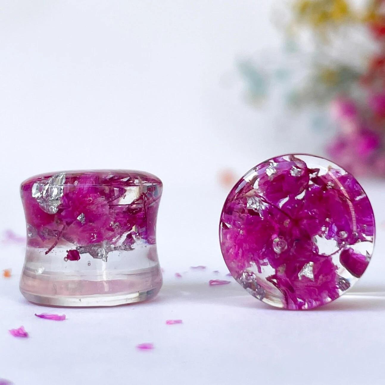 Dark pink flower ear gauges