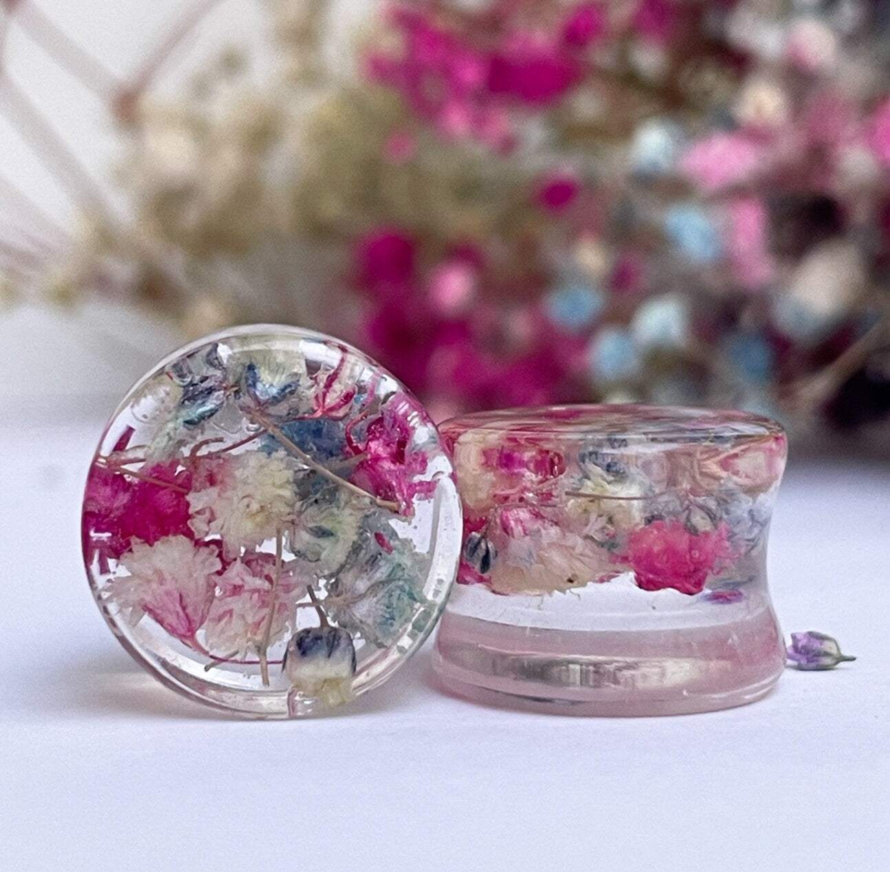 Pink, Light Blue and White coloured flower gauges