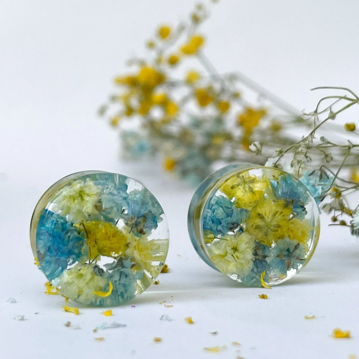 Blue and light yellow flower ear gauges