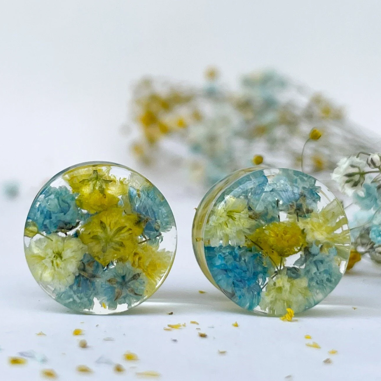 Blue and light yellow flower ear gauges