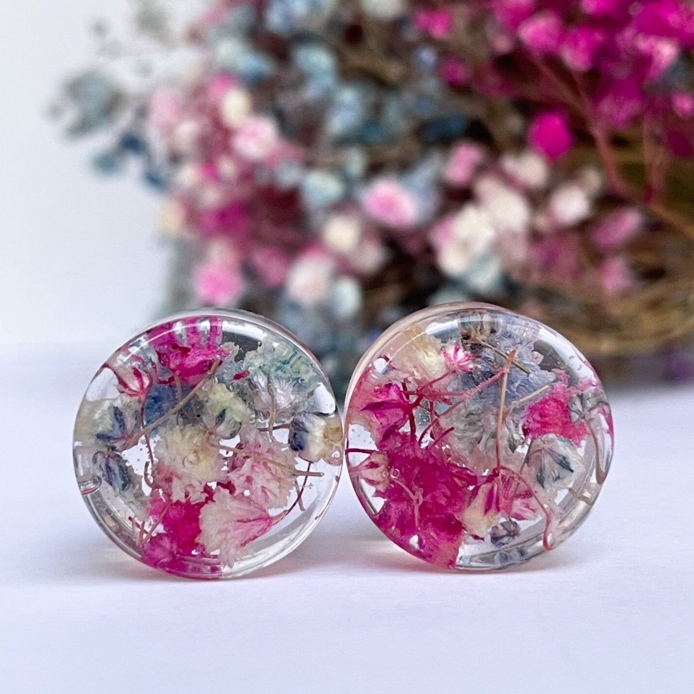 Pink, Light Blue and White coloured flower gauges