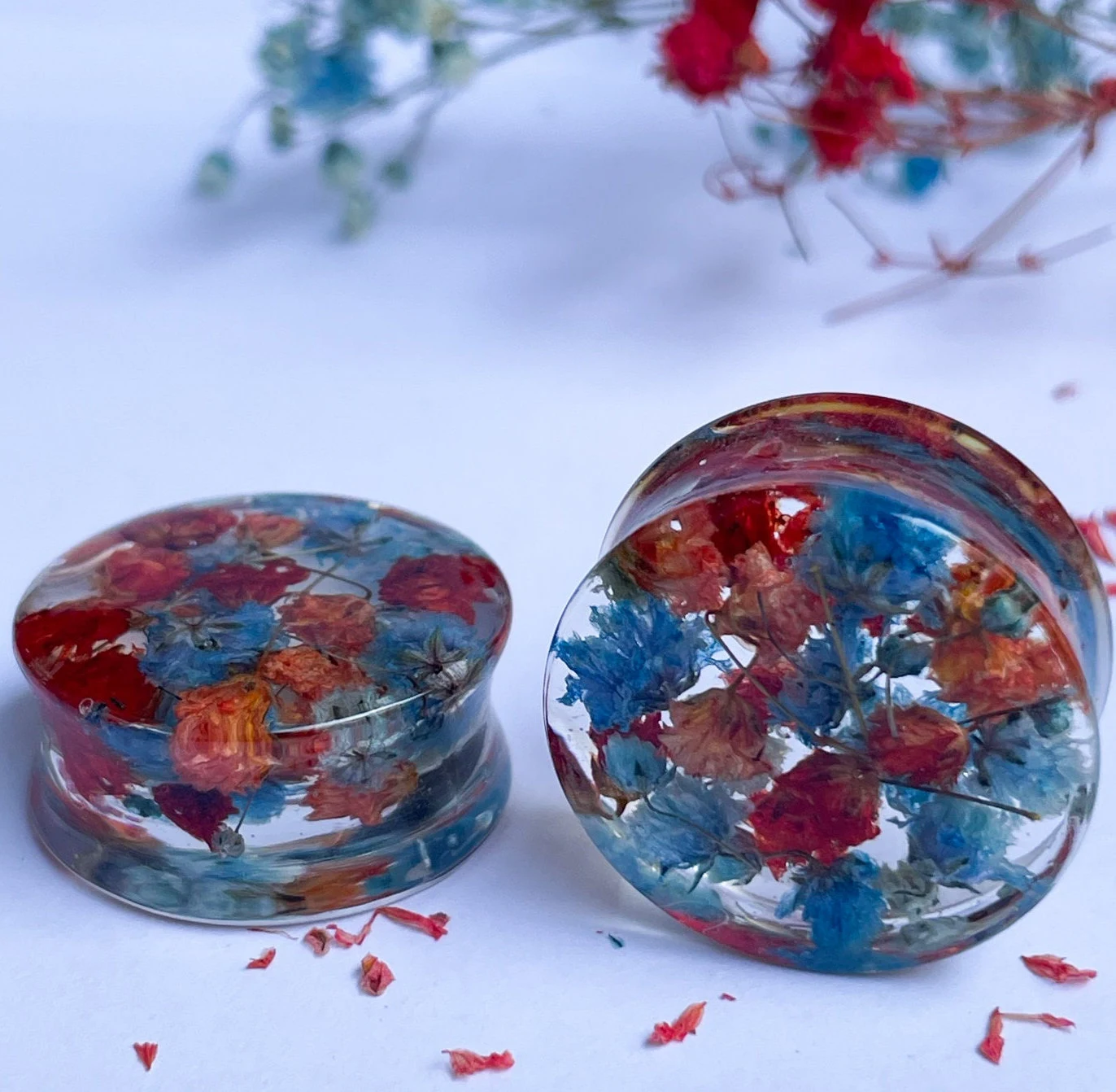 Blue and Red flower ear gauges