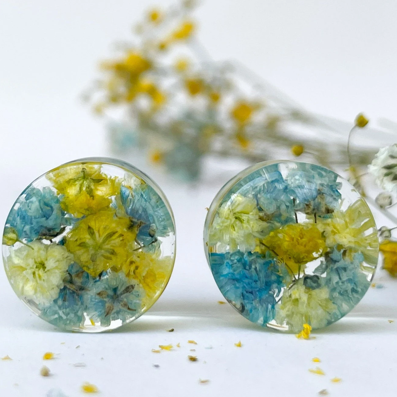 Blue and light yellow flower ear gauges