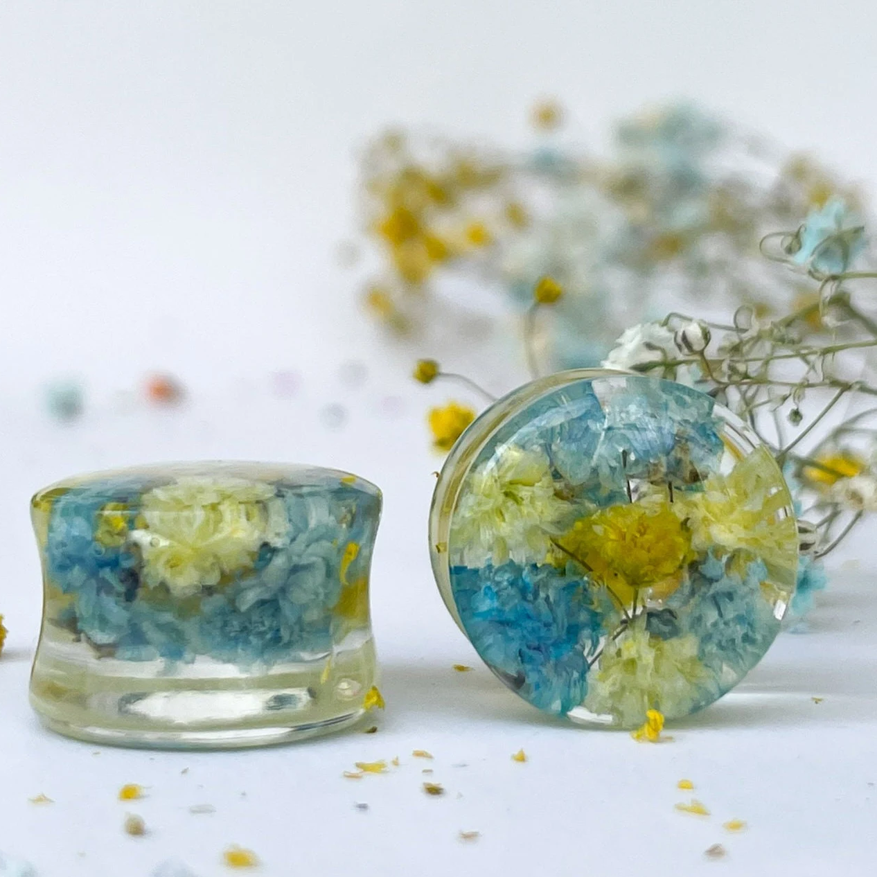 Blue and light yellow flower ear gauges