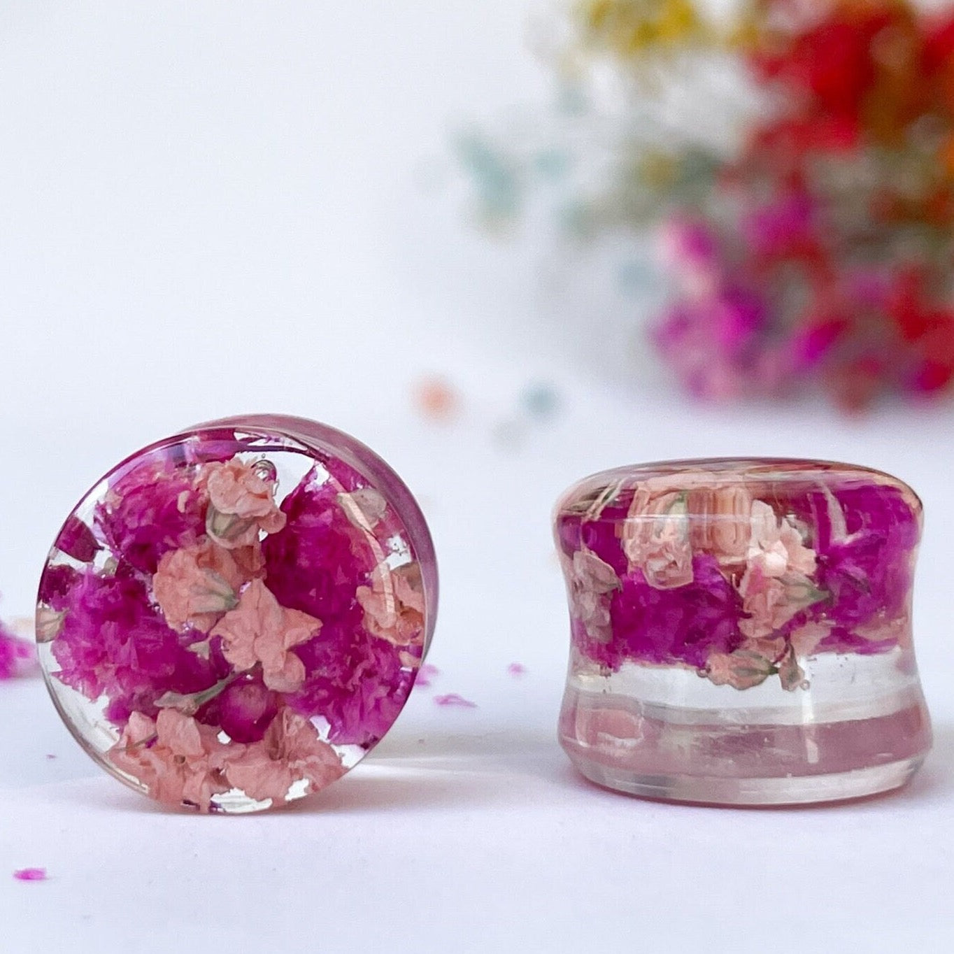 Dark pink and light pink flower ear gauges