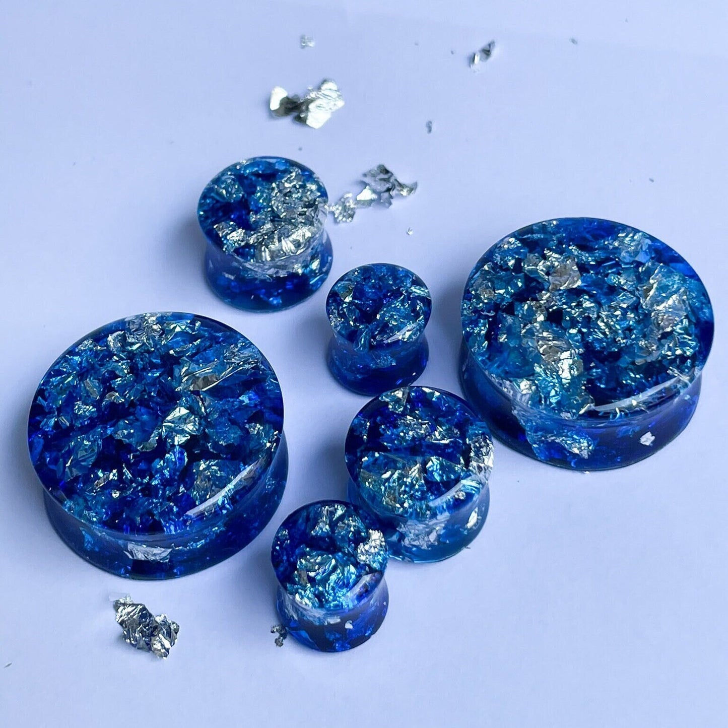 Blue resin and silver colour flake ear gauges