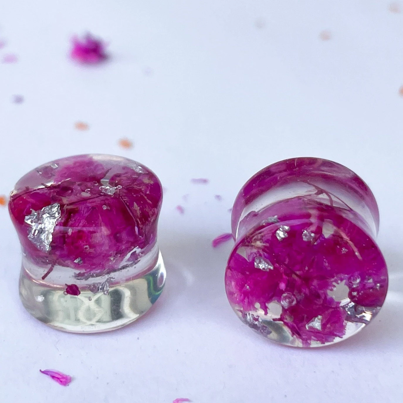 Dark pink flower ear gauges