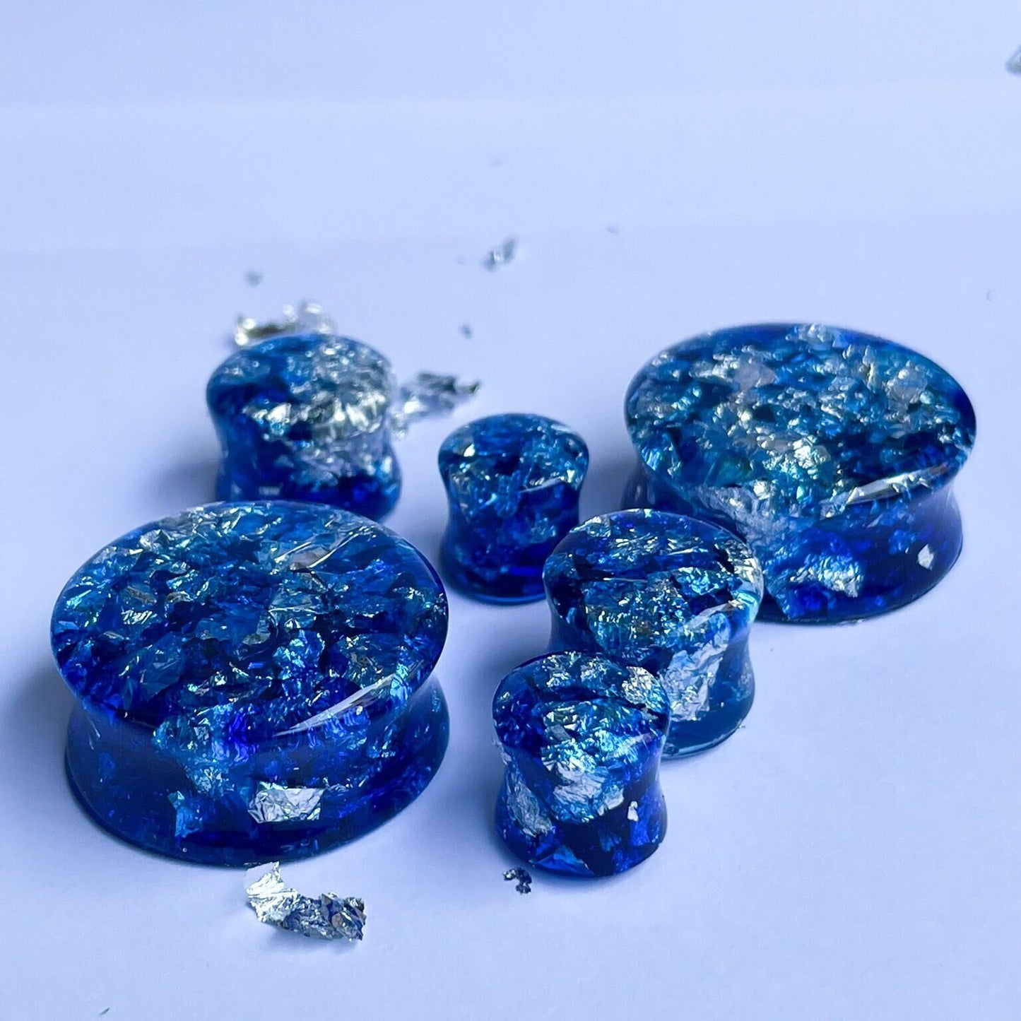 Blue resin and silver colour flake ear gauges