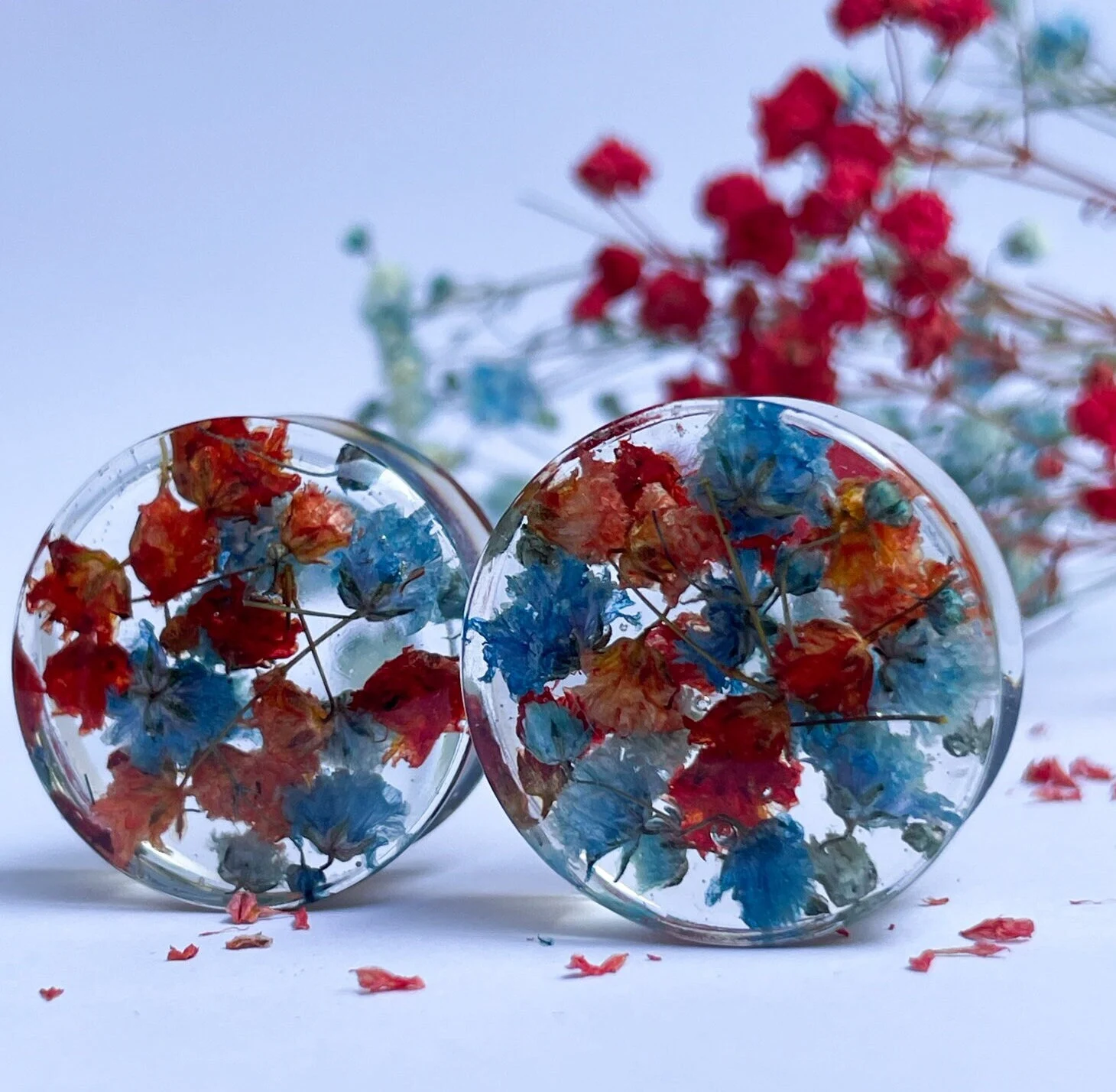 Blue and Red flower ear gauges