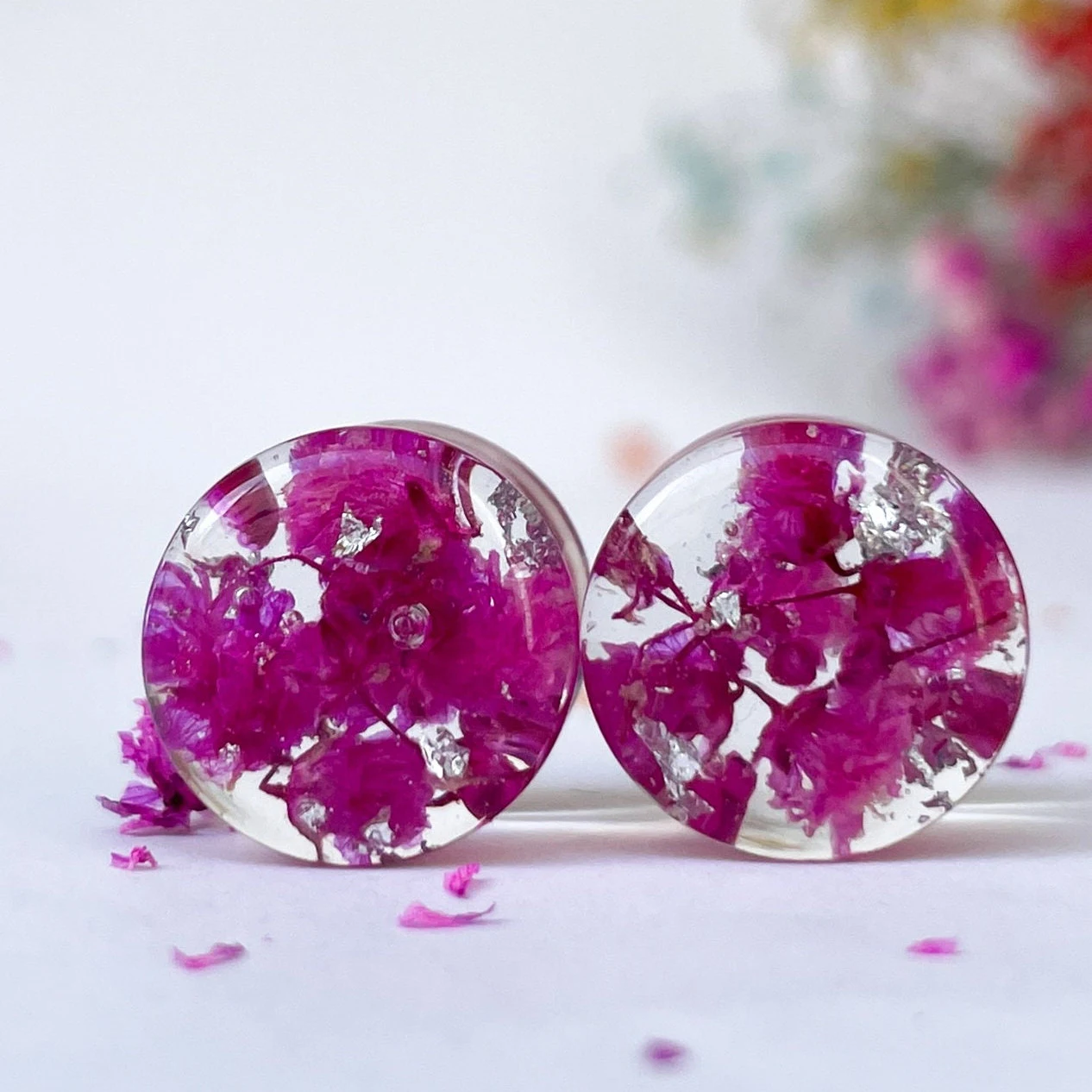 Dark pink flower ear gauges