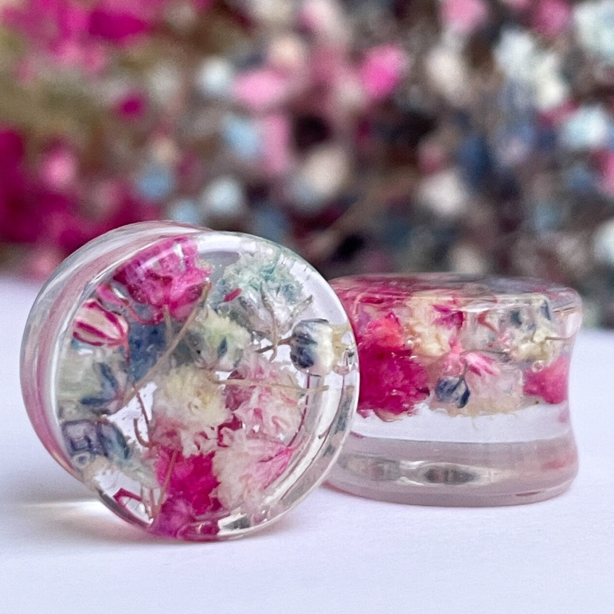 Pink, Light Blue and White coloured flower gauges