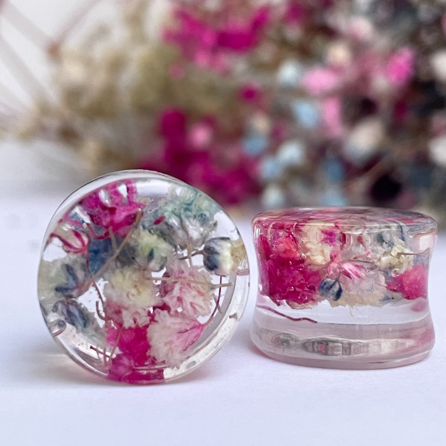 Pink, Light Blue and White coloured flower gauges