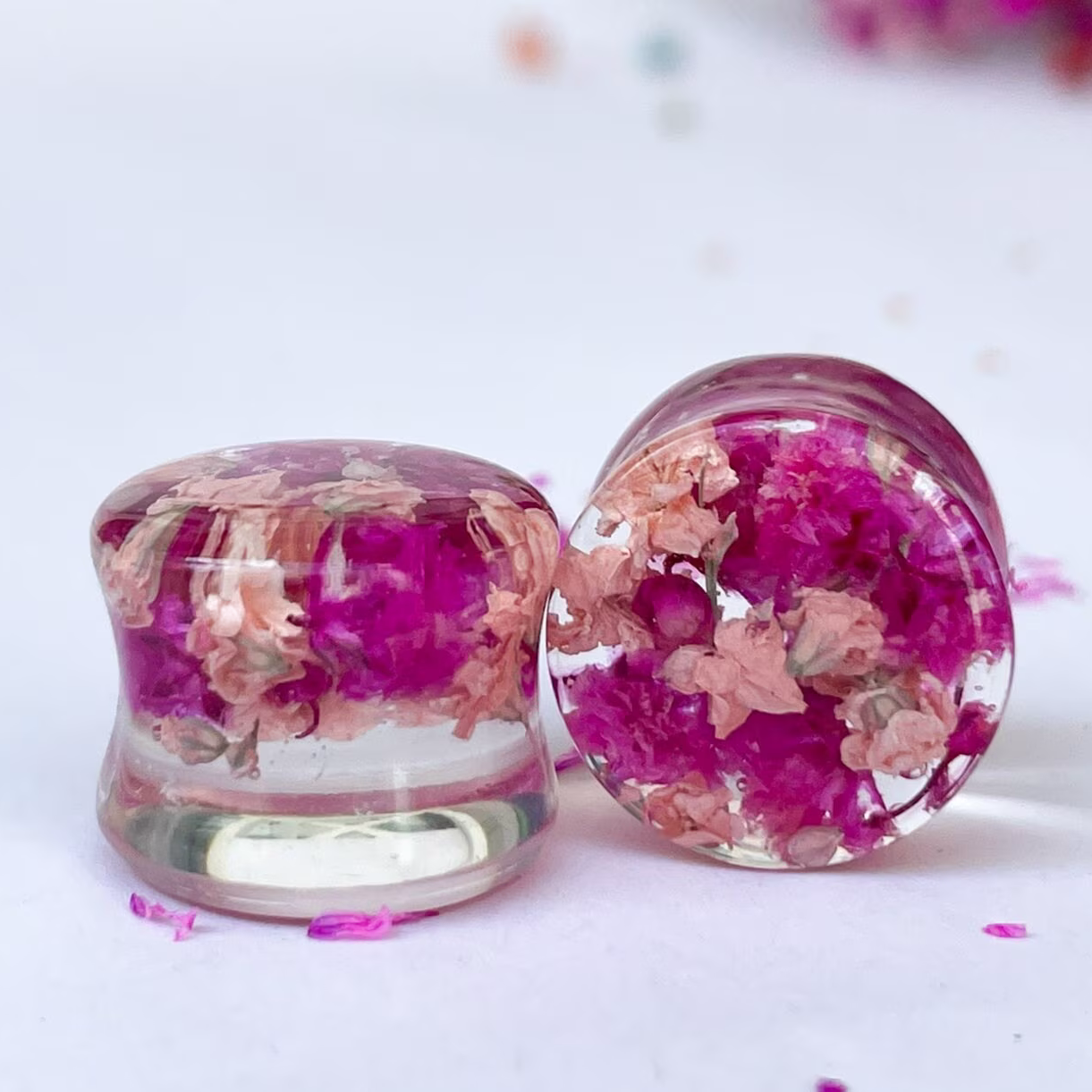 Dark pink and light pink flower ear gauges