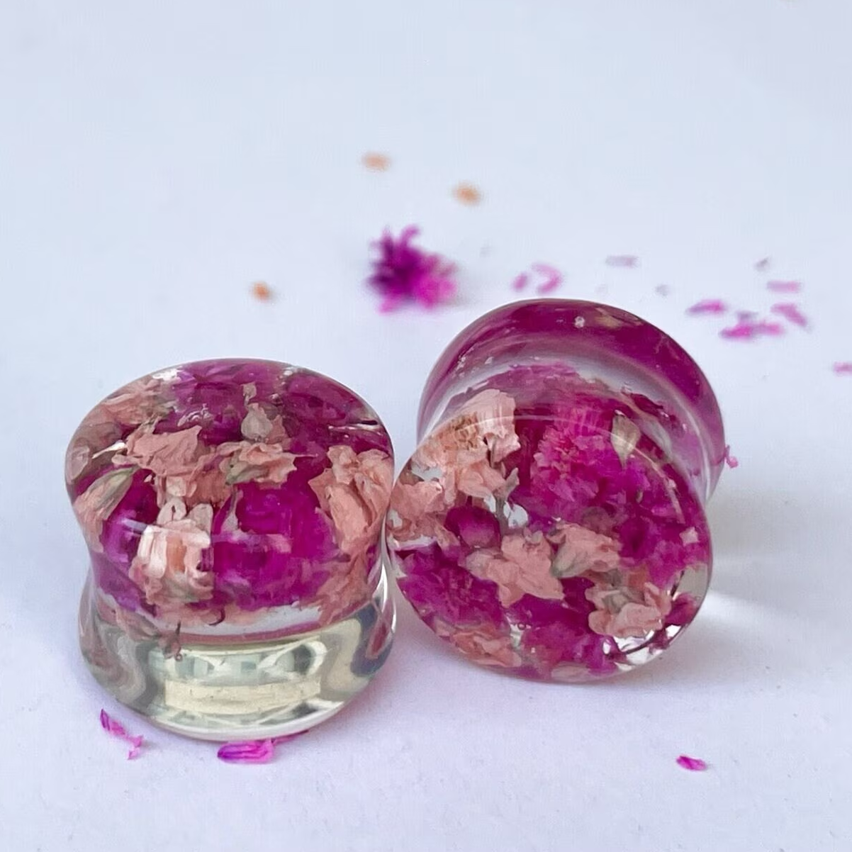 Dark pink and light pink flower ear gauges