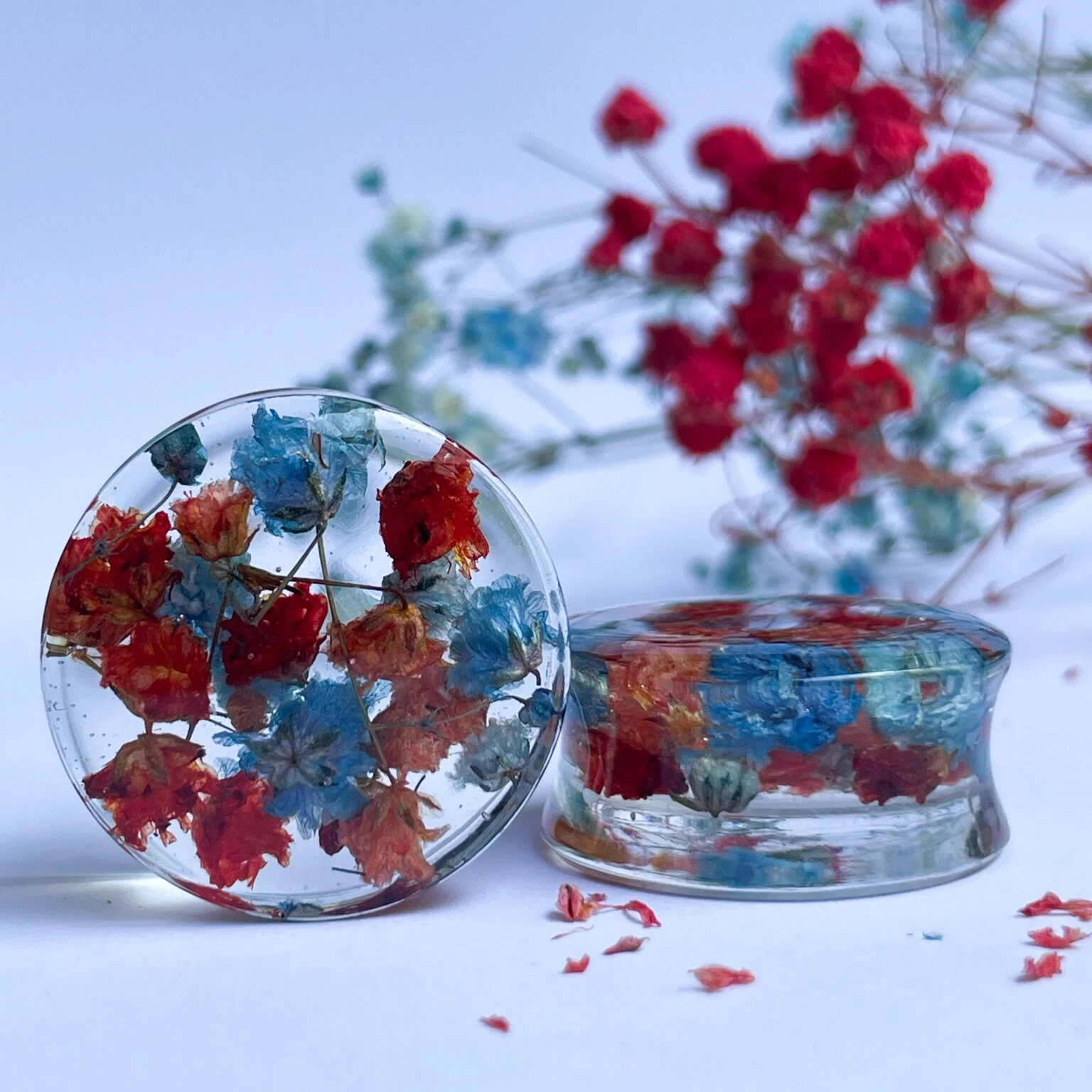 Blue and Red flower ear gauges