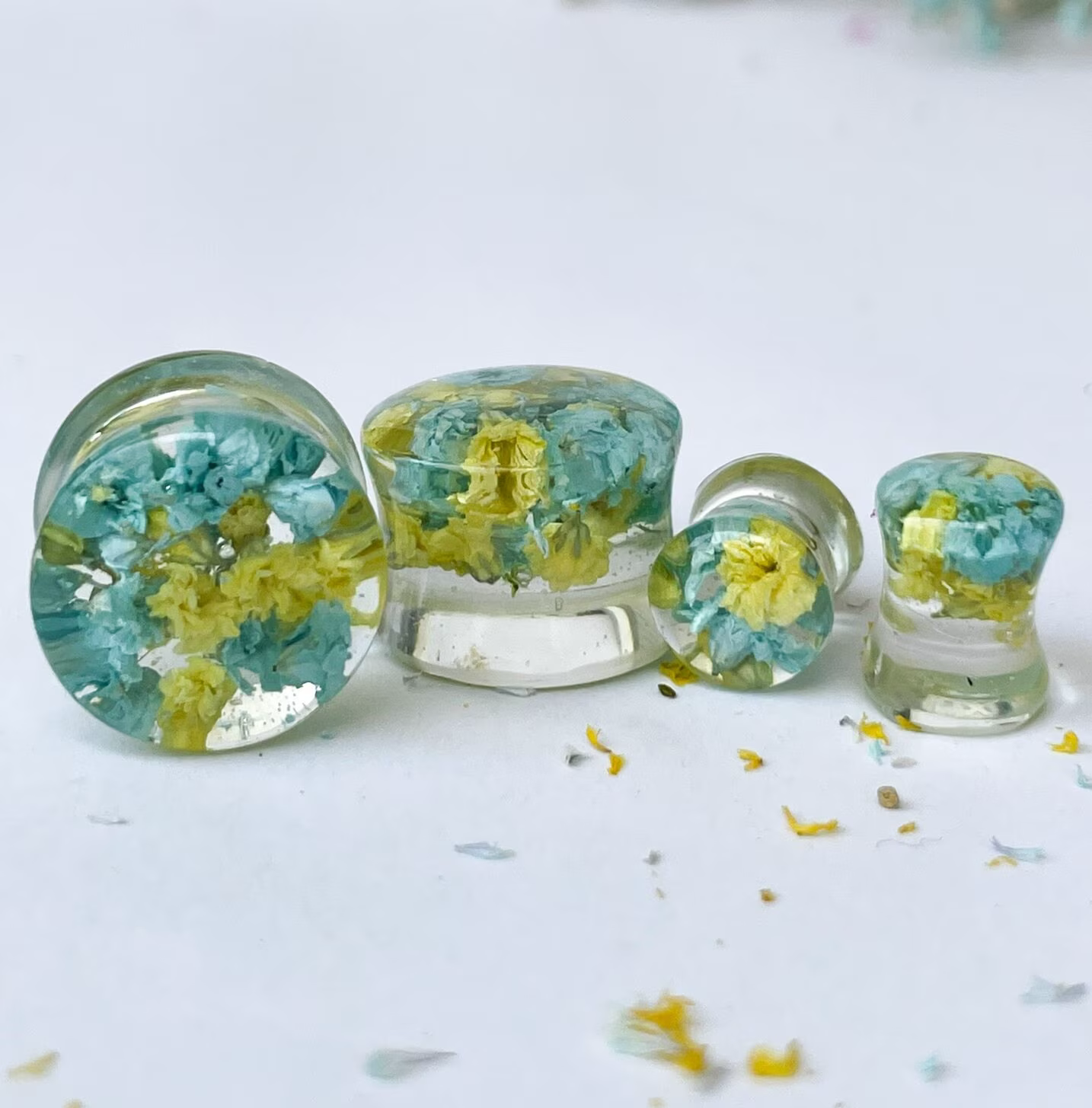 Blue and yellow flower ear gauges