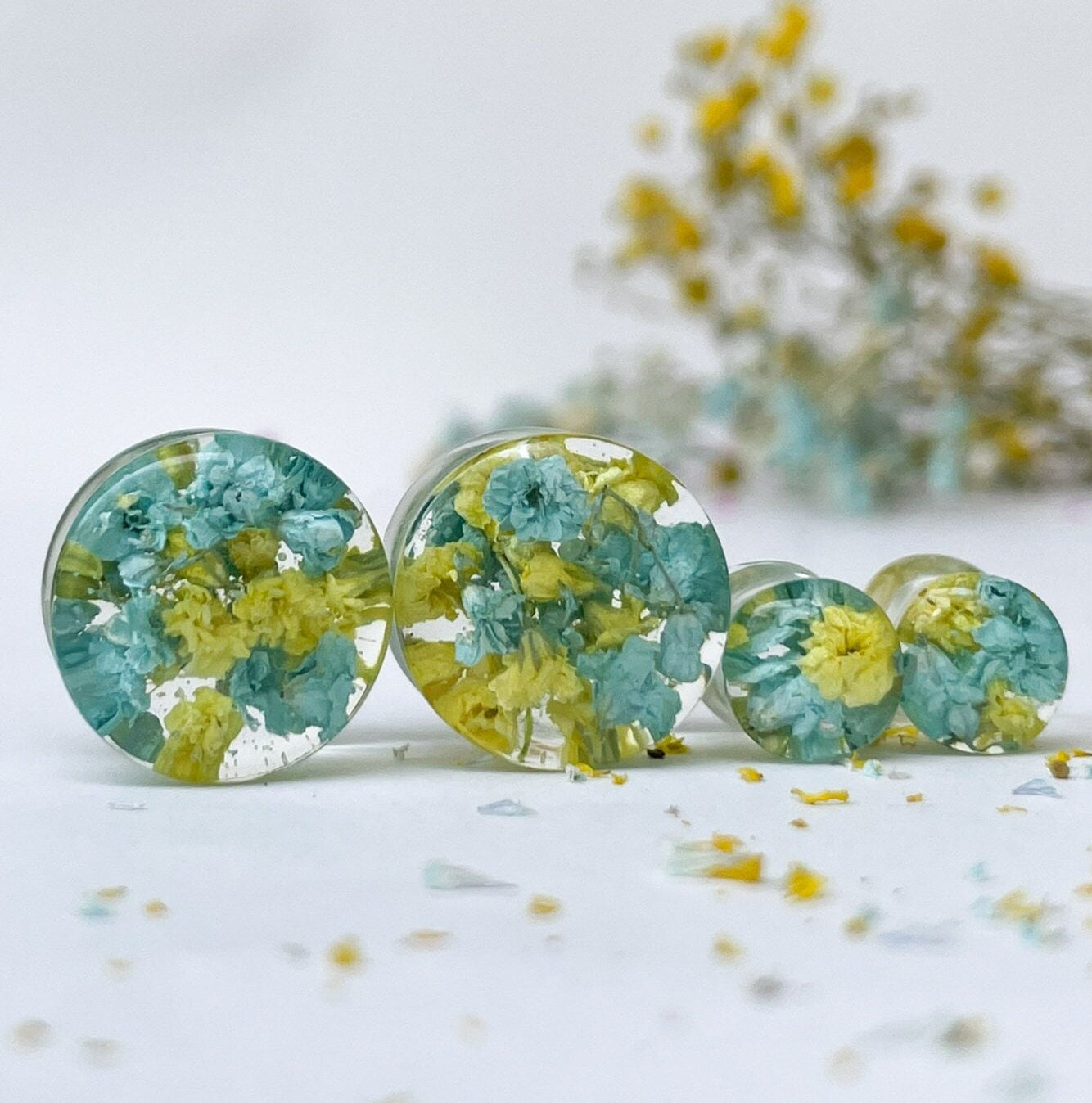 Blue and yellow flower ear gauges