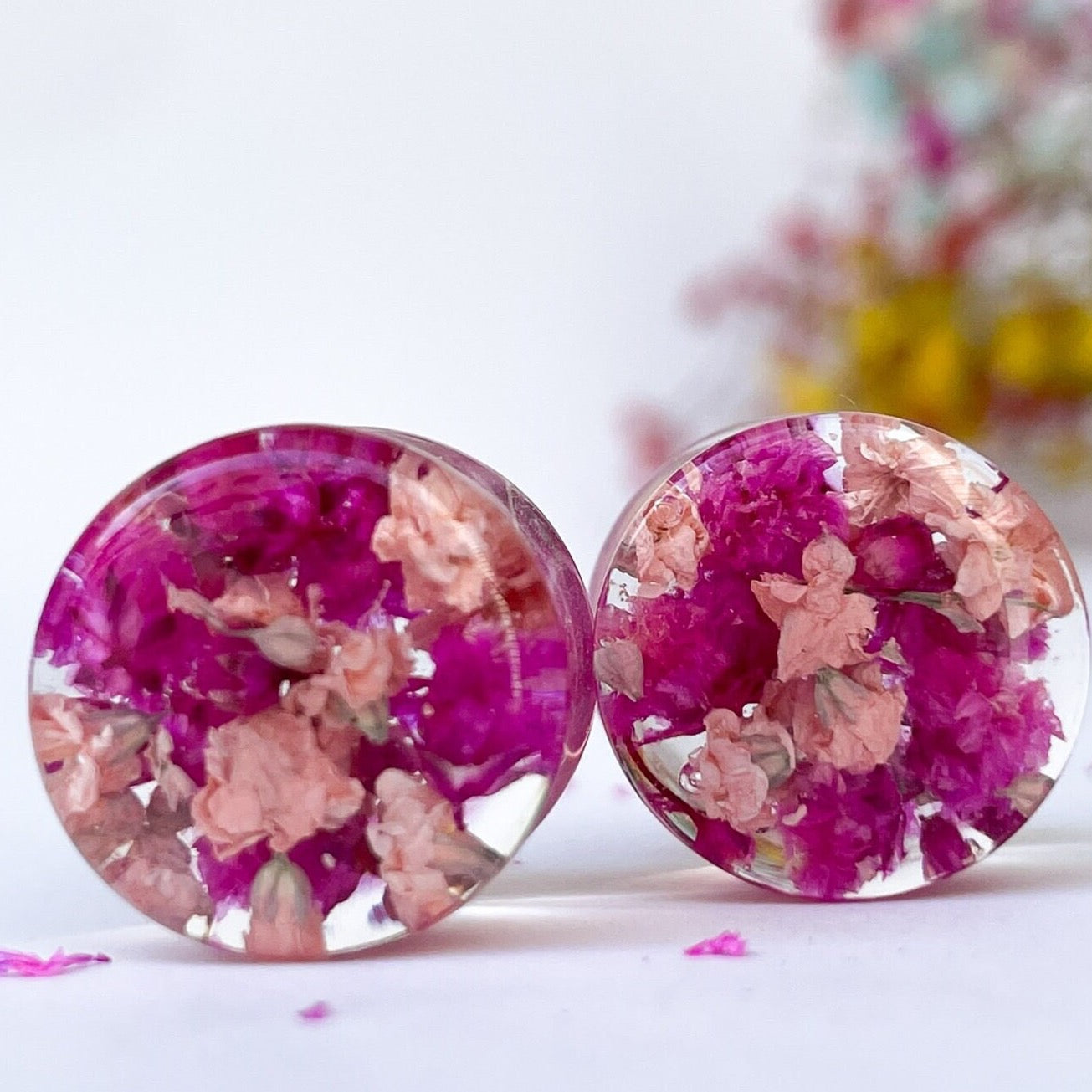 Dark pink and light pink flower ear gauges