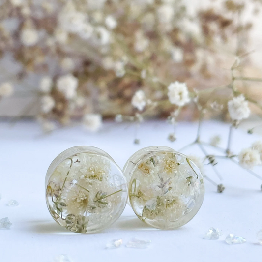 White flower plugs ear gauges