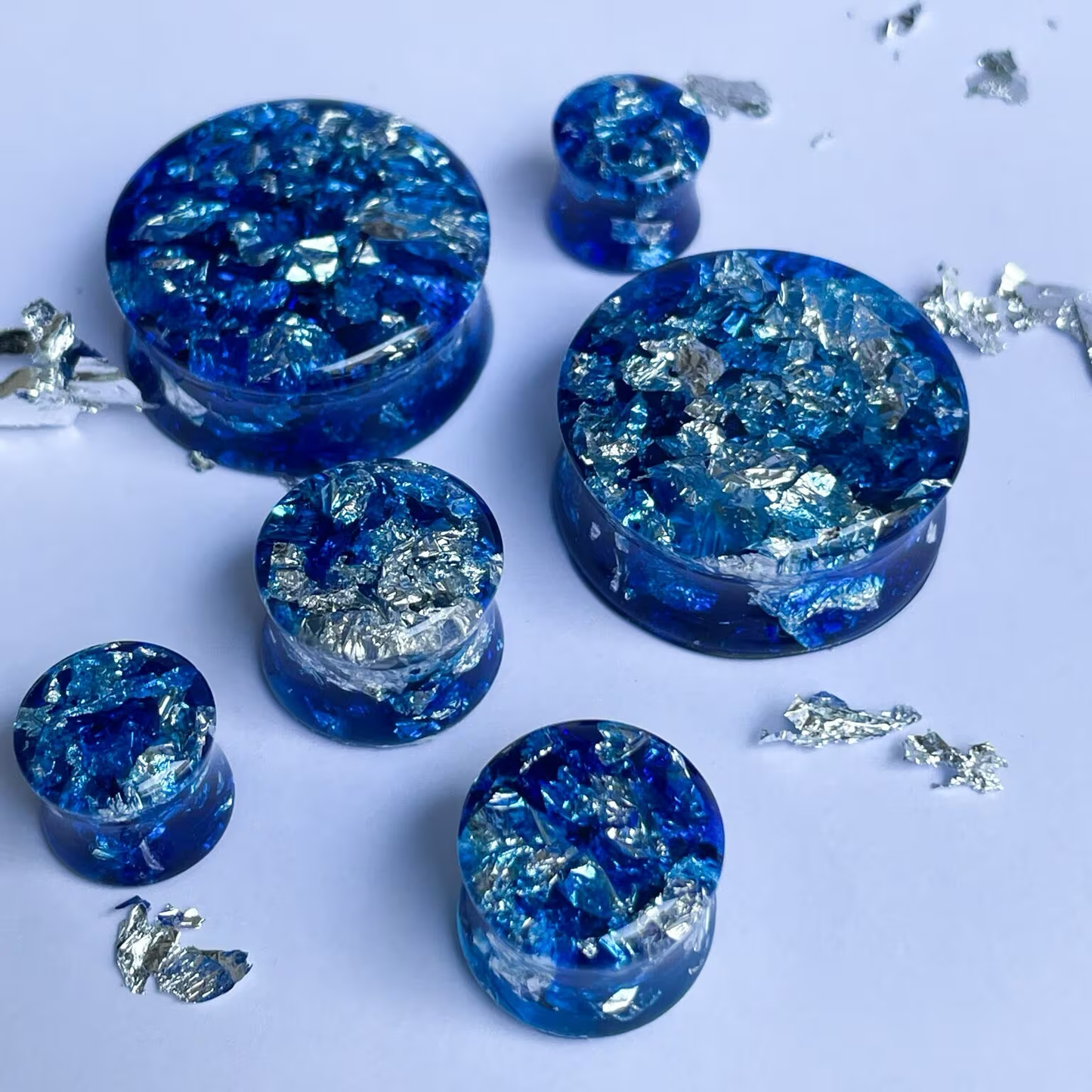 Blue resin and silver colour flake ear gauges