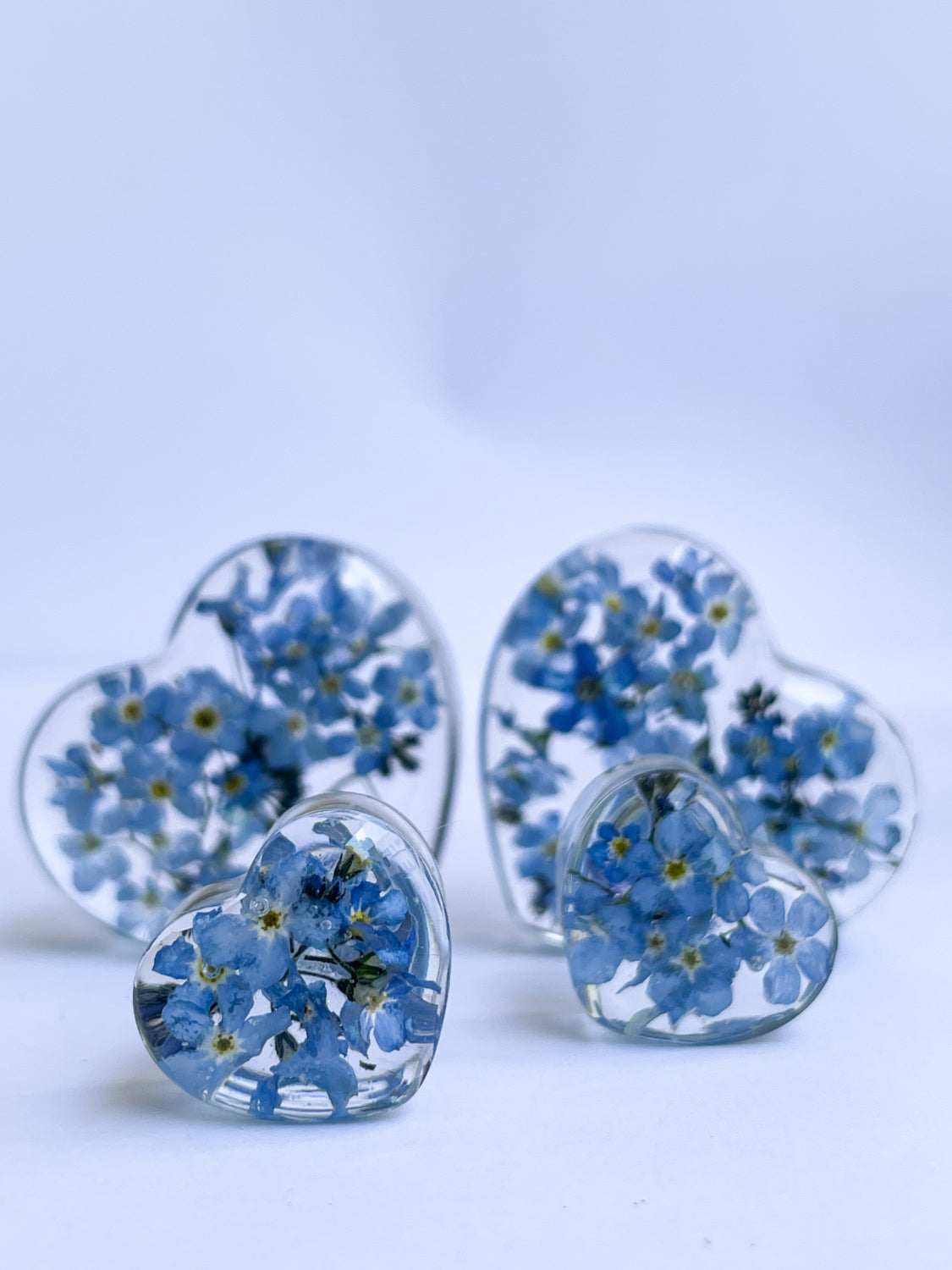 Forget me not transparent flower Heart shaped ear gauges