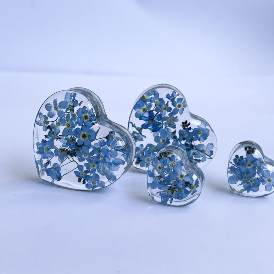 Forget me not transparent flower Heart shaped ear gauges