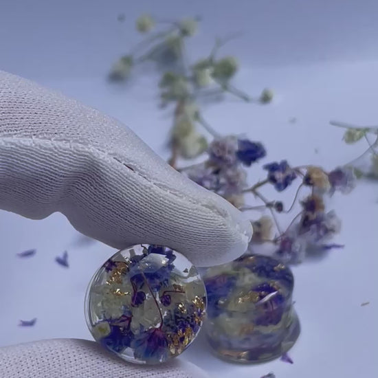 Purple and White transparent ear gauges