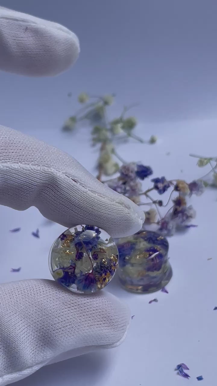 Purple and White transparent ear gauges