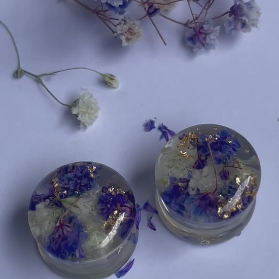 Purple and White transparent ear gauges