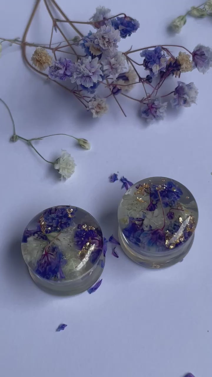 Purple and White transparent ear gauges